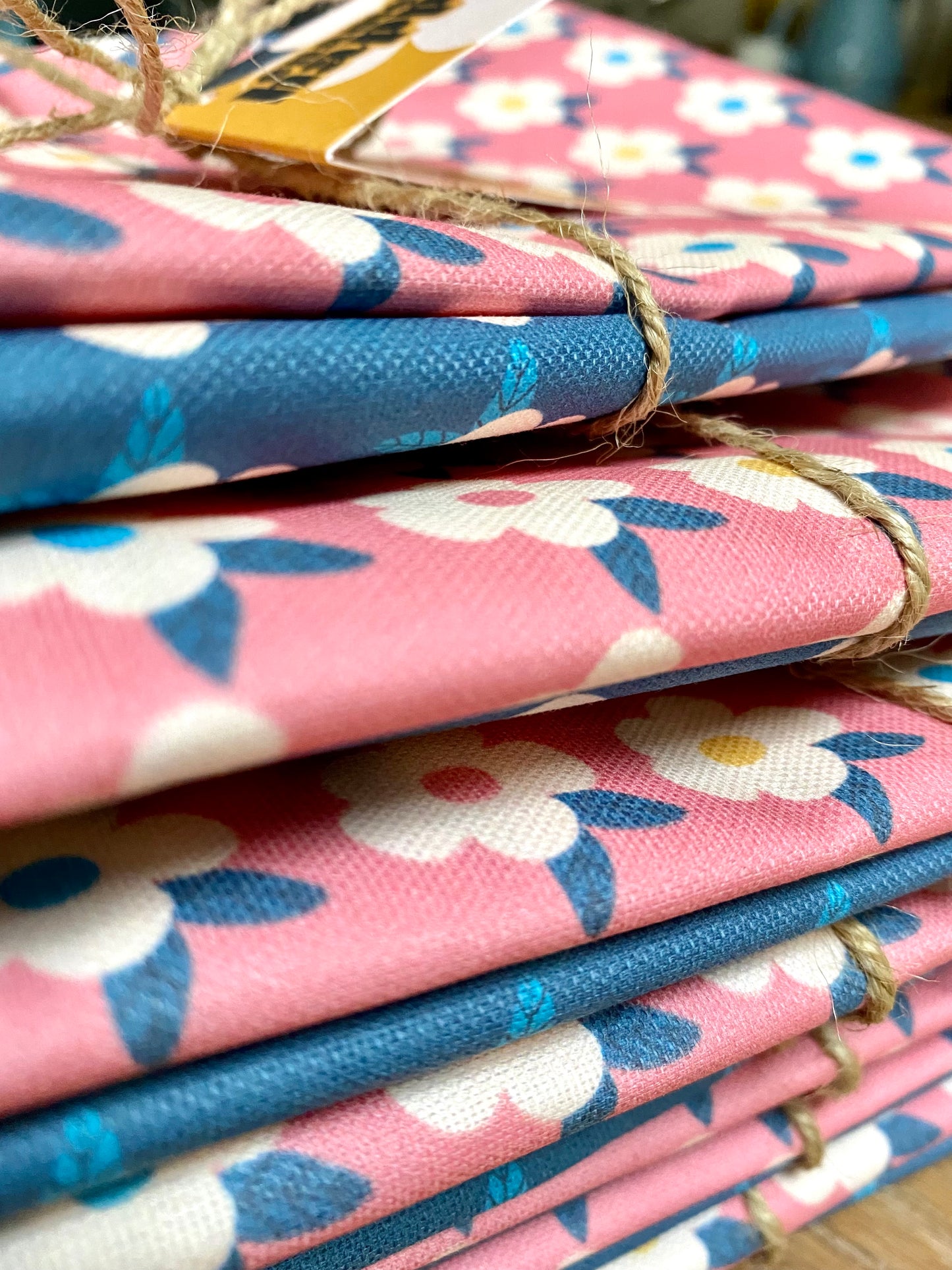 Pair of retro floral tea towels in rose pink and midnight blue 